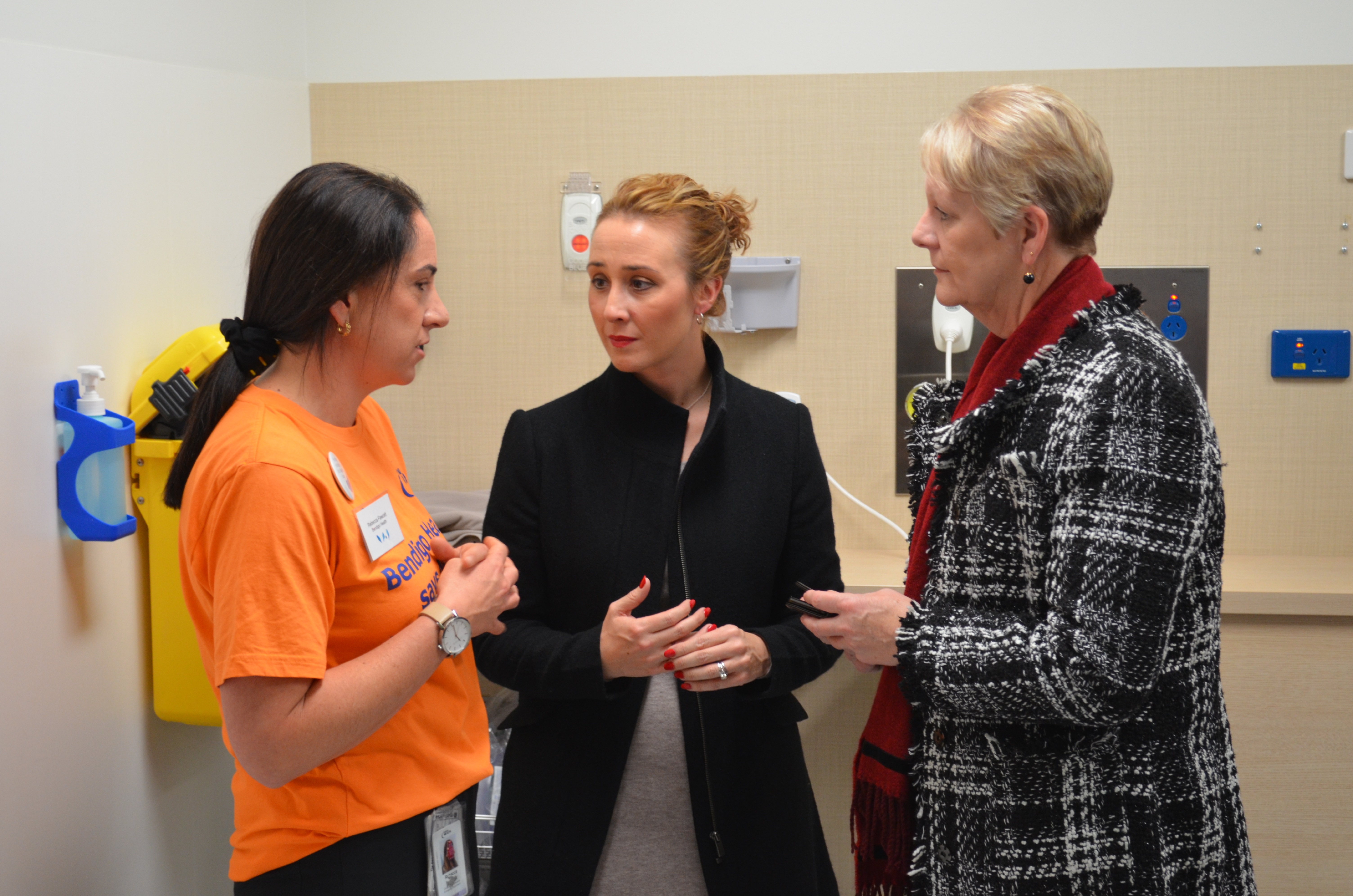 Bendigo Health ED nurse Rebecca Fawcett (left) discussing family violence training in public hospitals with Minister for Prevention of Family Violence Gabrielle Williams and Member for Bendigo West Maree Edwards.